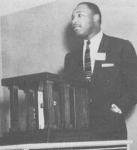Dr. Martin Luther King, Jr. speaking at Green Lake in 1956